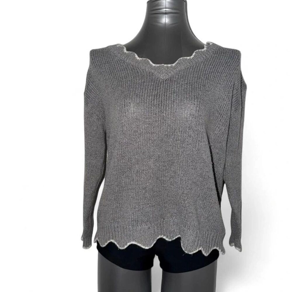 Gray knit sweater with scalloped hem and neckline